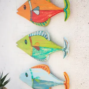 3 wooden fish wall hangings